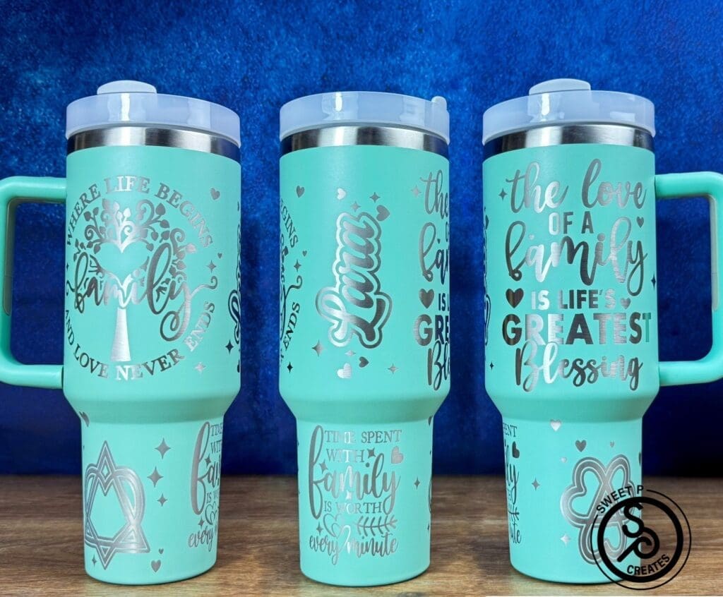 Three teal mugs with family-themed designs.
