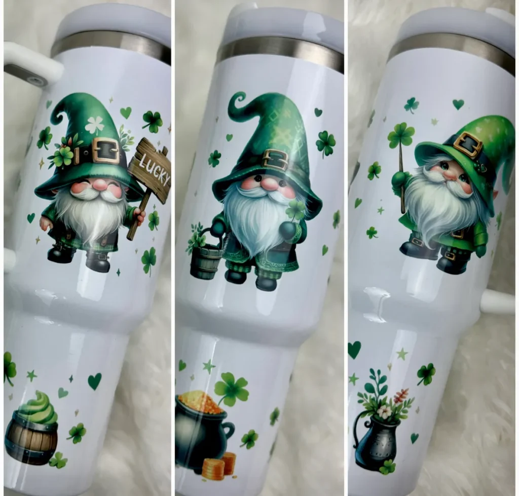 A close up of three different cups with pictures on them