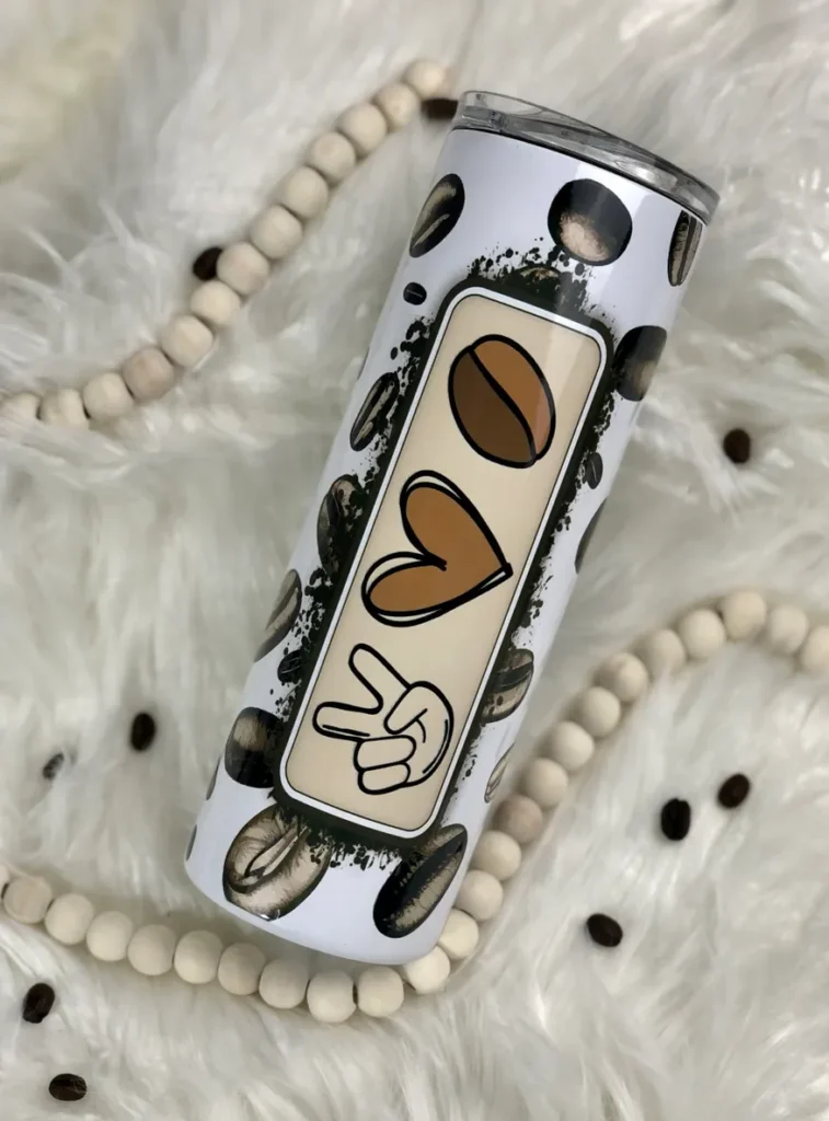 A white and black polka dot pattern with hearts, peace signs, and coffee.