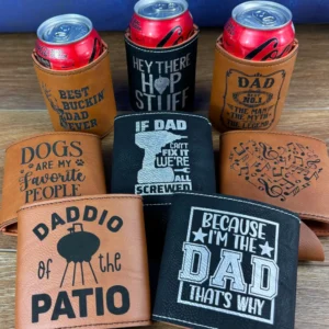 A group of beer koozies sitting on top of a table.