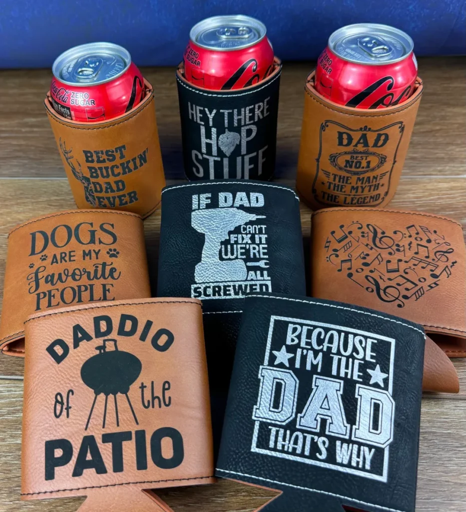A group of beer koozies sitting on top of a table.
