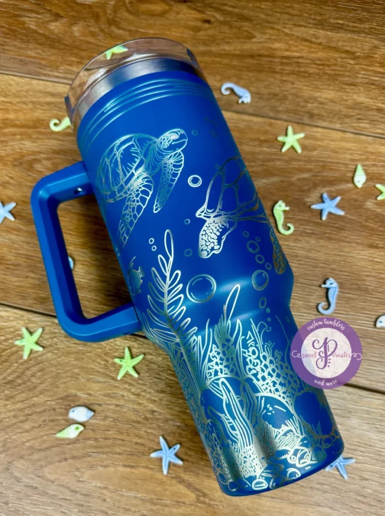 A blue thermos sitting on top of a wooden table.
