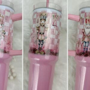 Nutcracker-themed pink drink container with decorations.