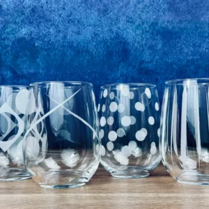 Patterned glassware against a blue background.