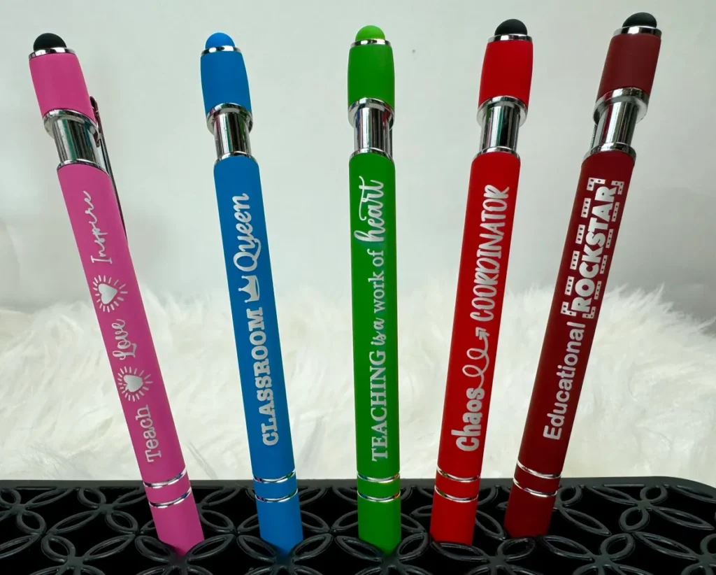 Colorful pens with motivational teaching messages.
