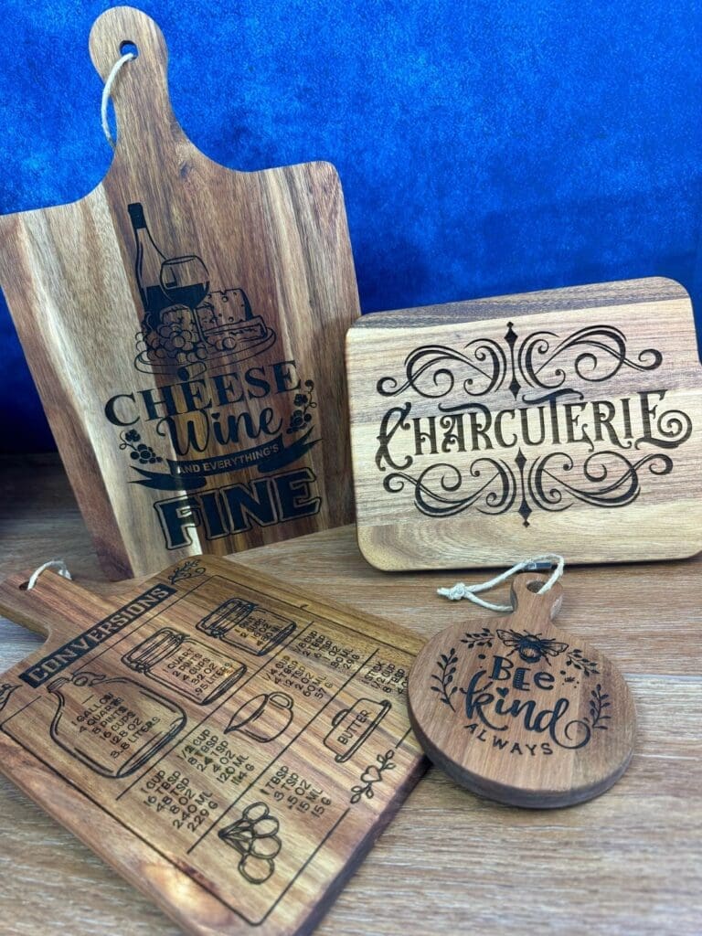 Decorative wooden kitchen boards with designs.