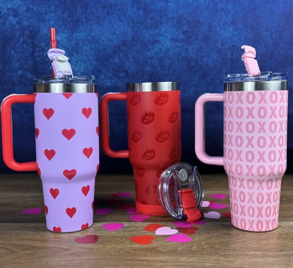 Colorful mugs with heart and lip patterns.