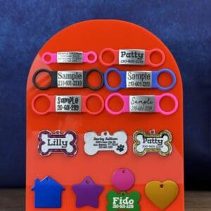 Aluminum Pet ID Tags on a red surface