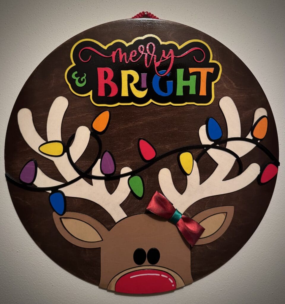 Reindeer decoration with colorful lights, "Merry & Bright.