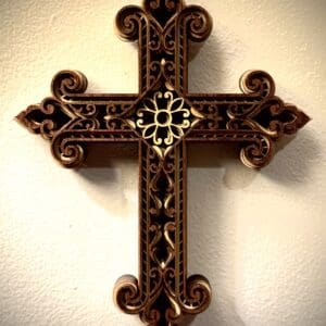 Ornate wooden cross with intricate carvings.