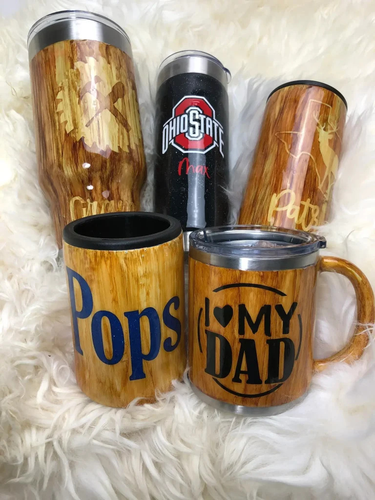 Assorted personalized mugs on a fluffy background.
