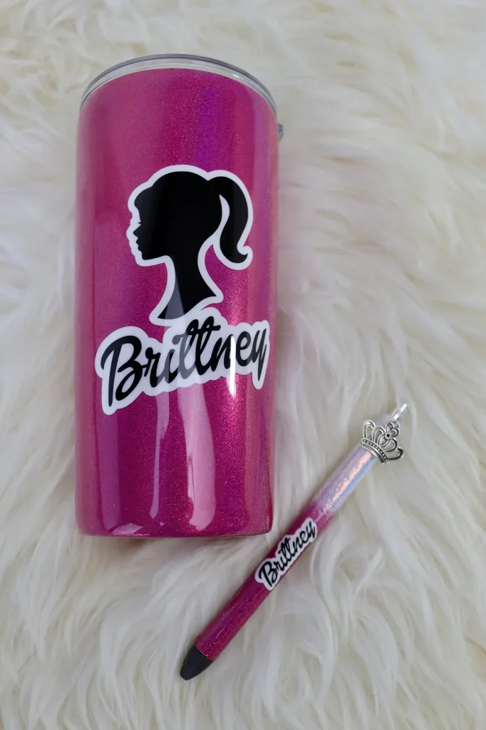 Pink tumbler and pen featuring "Brittney" design.