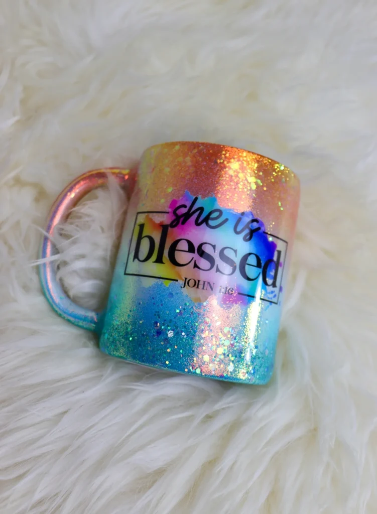 Colorful mug with "she is blessed" text.