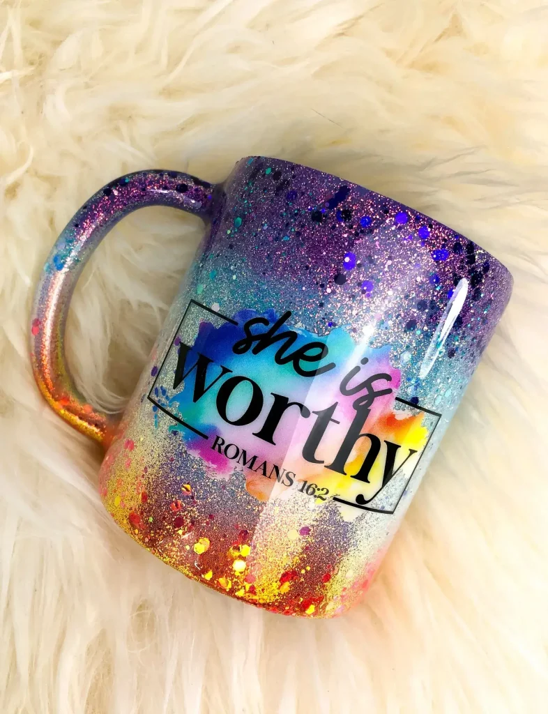 Colorful mug with "she is worthy" text.