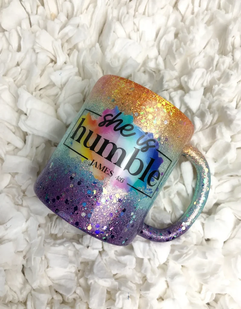 Colorful mug with "she is humble" text.
