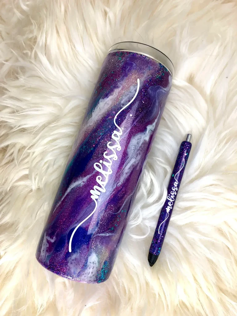 Purple galactic tumbler and matching pen.